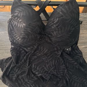 Black bathing suit top. Tag reads: Size 1 (16/18).